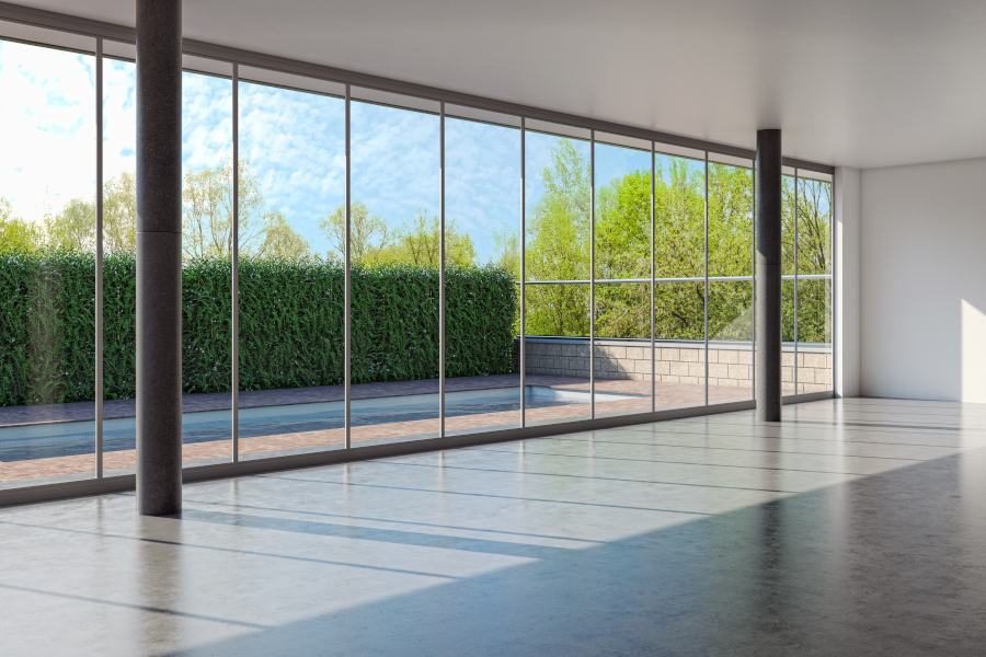 Glas-Trennwand mit rahmenloser Optik für elegante Raumaufteilung